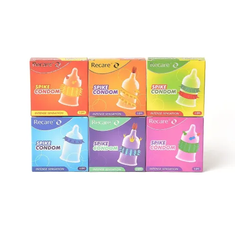 Насадка на член Recare Spike Condom Pink (презерватив з кульками та рядами шипів)